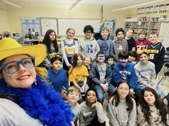 Fifth-graders won a point on Spirit Day for having the most school spirit. They were led by their English Language Arts teacher Amanda Sanders.