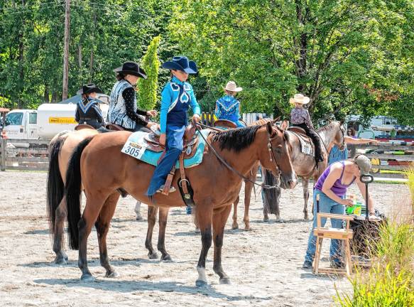 <b>Western dress competition Saturday, Aug. 2. (Photo by Nancy Madacsi)</b>