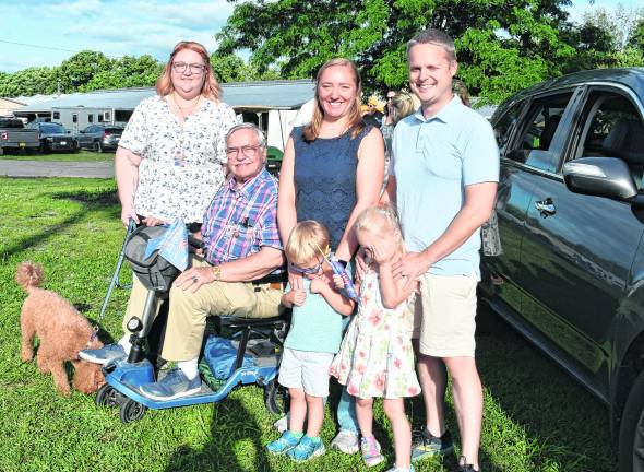 <b>Erica and Rich Genabith, Amanda, Tom,Sarah and Luke Kennedy donated the pole and garden.</b>