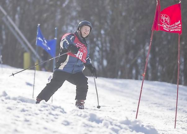 An athlete skis down the slope at Mountain Creek.