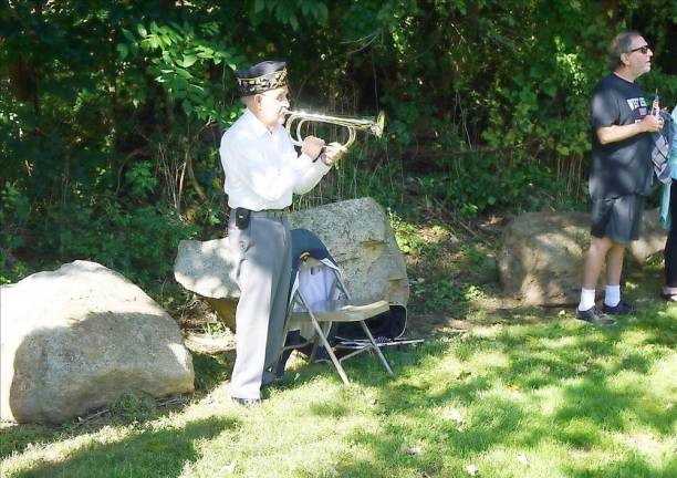 A member of American Legion Post 278 plays “Taps (Photo by Vera Olinski)