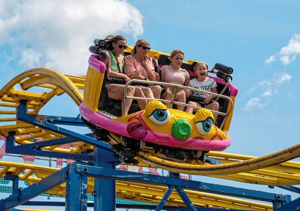 <b>Fair-goers take a ride Saturday, Aug. 2. (Photo by Nancy Madacsi)</b>