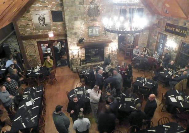 Local law enforcement officers and their guests gather in the main dining room at the Mohawk House in Sparta on Thursday, Dec 8 to celebrate the 50th anniversary of the founding of the Sussex County Association of Chiefs of Police.