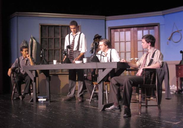 Photo by Viktoria-Leigh Wagner Pediatric Pulmonologist Dr. Gary Kohn speaks with parents about asthma.