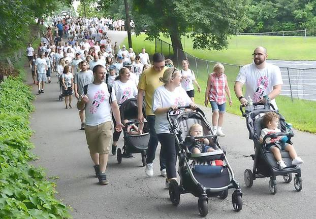 Participants march in support of addiction recovery, 2021.