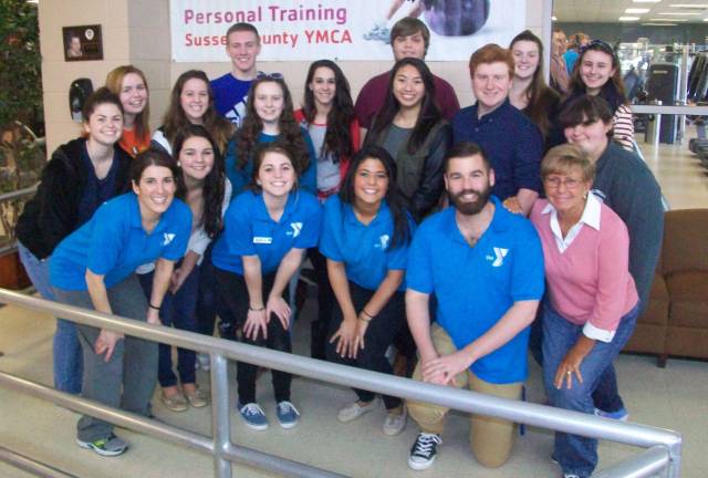Pictured in front row: Samantha Walter, YMCA's school-age child care and sport &amp; enrichment director, Gabrielle Conte, Carly DeOliviera, Kristen Bifano, Kevin Naser, and Carol Jurkouich, FBLA adviser; Row 2: Alexis DeOliveira, Ana Schroeder, Gabriella Ciasullo, Amanda Spindler, Arielle Stampone, Laura David, Connor Mendes, Nicole Andretta; Back row: Scott Mueller, FBLA membership vice president and initiator of the event, Kyle McKenna, McKenzie Gibson, and Madison Gerisch.