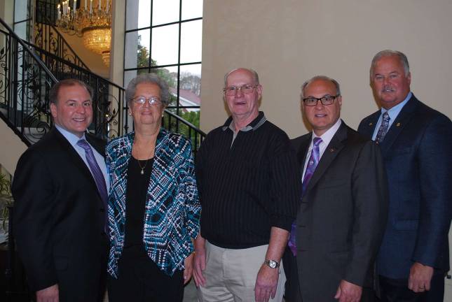 From left, RoNetco Supermarkets vice president and C.F.O. David P. Romano stands with 40-year honorees Barbara Boyle and Stanley Borden, with Domininick J. Romano, vice president and chief operationg officer and General Manager Hank Ramberger.