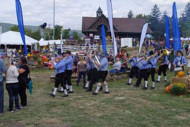 The Philadelphia German Brass Band, also known as &#x201c;Die Deutsche Blaskapelle von Philadelphia, weaves its way through the crowds.