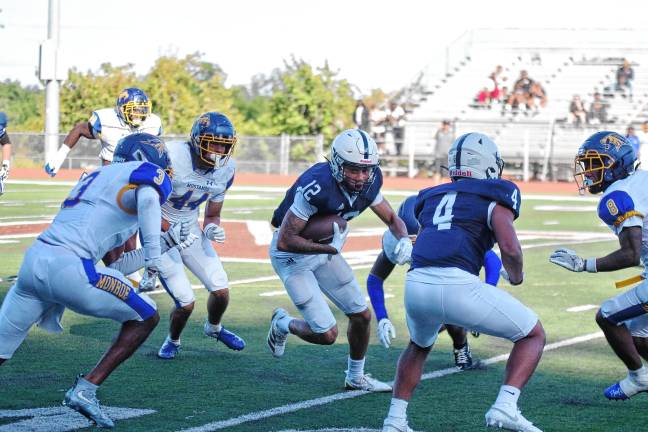<b>Sussex Skylanders ball carrier Deondre Jones looks for running room.</b>