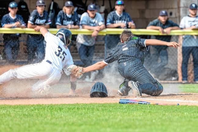 Wallkill Valley’s catcher Jack Tucker tries to make a sweeping tag of the Pequannock base runner Nick Zucala, who scored in the third inning of their game Tuesday, June 3. The Rangers won, 4-3, advancing to the final round of the NJSIAA North Jersey, Section 1, Group 1 tournament. They will play Midland Park there at 4 p.m. Thursday, June 5. (Photos by Glenn Clark)