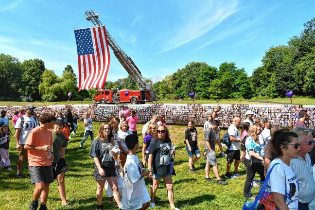 Participants set off on a one-mile walk through Franklin on Saturday, Aug. 2. (Photos by Maria Kovic)