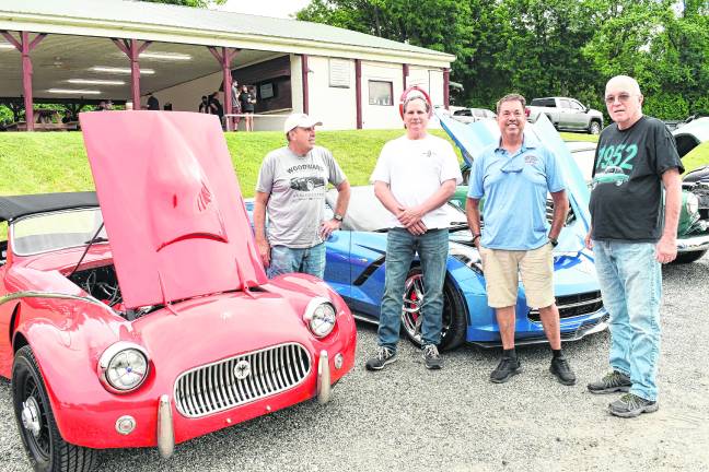 Bill Link of West Milford, left, stands next to his custom 1950s car with Greg McKenzie of West Milford, Andy Breur of West Milford and Joe Warner of Sparta.