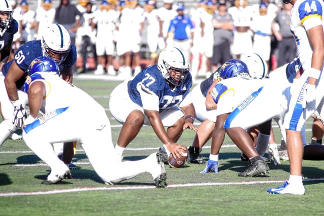 <b>Sussex Skylanders center Aiden Jones (77) is ready to snap the ball.</b>