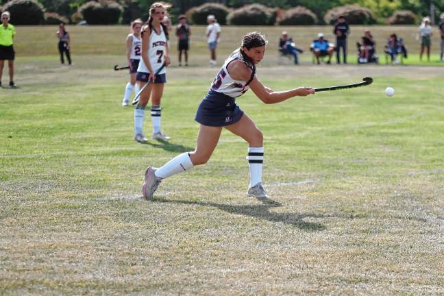 Lenape Valley’s Sadie Fagerlin strikes the ball with her stick.