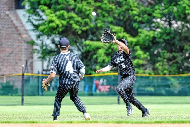 CJ Collins comes in from centerfield to track down a fly ball in the bottom of the first inning.