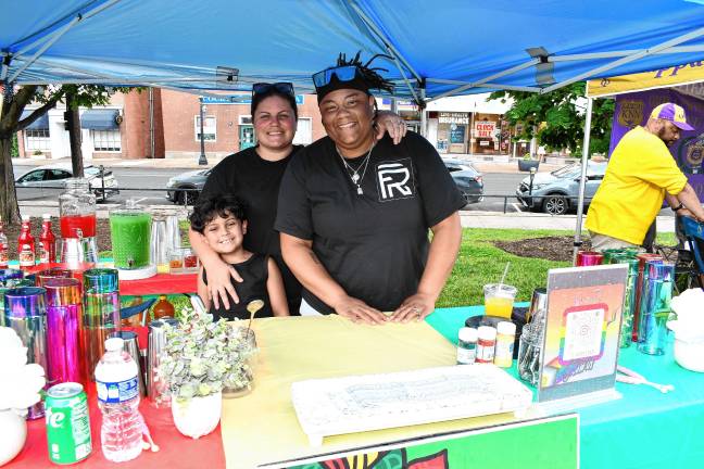 JN5 Aaron Hernandez, Rebecca Messler and Brittney McKlin, all of Stroudsburg, Pa., promote Flooid Reserve Mobile Bartending. (Photo by Maria Kovic)