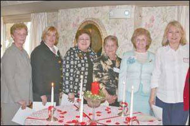 Woman's club installs officers