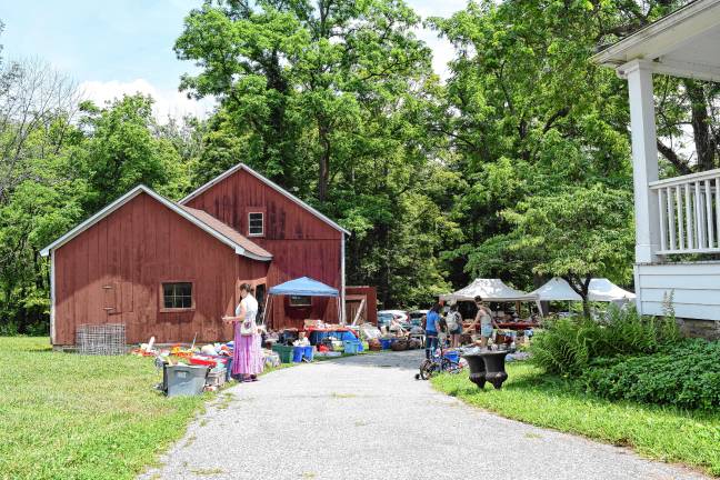 <b>The Attic Treasures sale inside and outside the barn.</b>