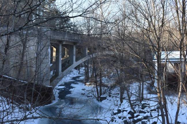 Milford’s Route 209 bridge over the Sawkill Creek, built in 1942, is in “serious” condition, a worse rating than the bridge that collapsed in Pittsburgh. It is on PennDOT’s docket to be rehabilitated in 2023, a $3.7 million job that includes the construction of a 200-foot temporary bridge to handle traffic while the main bridge is out of commission. (Photo by Becca Tucker)