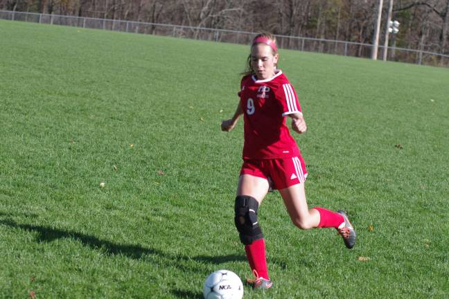 High Point's Lauren Weiss about to kick.