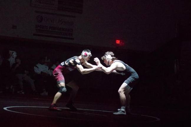 Pompton Lakes' Joseph Aungst, left, takes on Wallkill Valley's Owen Crowell in the 150-pound weight class. Aungst won by decision, 7-0.