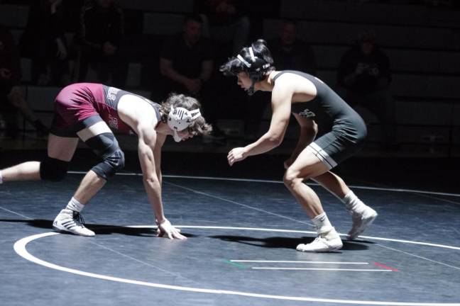 Pompton Lakes' Angelo Fusaro, left, faces Wallkill Valley's Gabe Uy-Garcia in the 138-pound weight class. He pinned Uy-Garcia in 1:04 to earn the win.