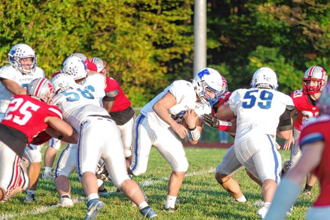 <b>KIT1 Kittatinny quarterback Jack Brex runs with the ball. He made the Cougars’ only touchdown in the game.</b>