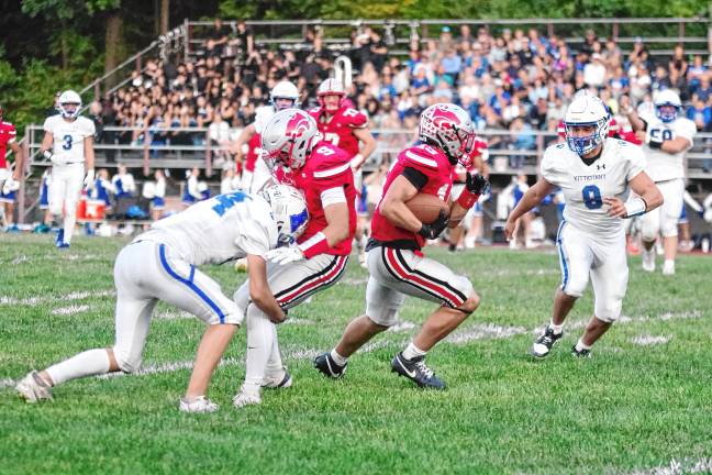 <b>HP1 High Point ball carrier Jerron Martress finds an opening in the game against Kittatinny on Friday, Sept. 12. He scored twice and rushed for 143 yards. The Wildcats won, 14-7. (Photos by George Leroy Hunter)</b>