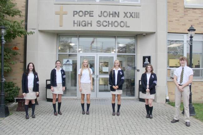 From left: Pope John XXIII Regional High School seniors Taylor Ferguson, Lucy Campbell, Gabrielle Ursin, Anna Ursin, Katrina Veal, and Garrett Young (Photo by Anthony Spaulding)