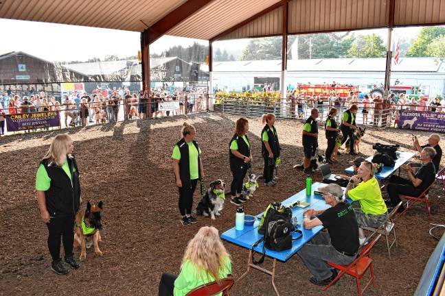 <b>The Puppy-Wuppy Dog Obedience Team performs Sunday, Aug. 3. (Photo by Maria Kovic)</b>