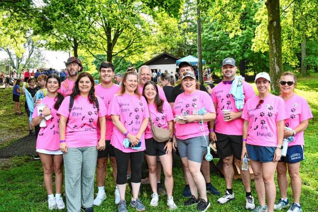 Members of Team Assante walk in memory of Danielle Assante, who died of an overdose in April 2022. She was 36.