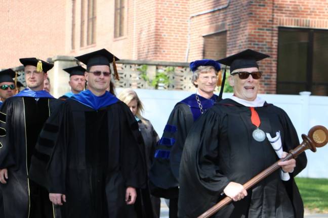 Sussex County Community College officials march into the commencement ceremony.