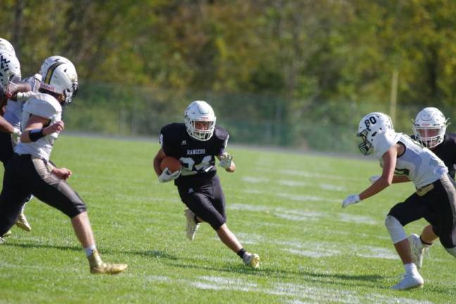Wallkill Valley ball carrier Shane Nugent moves towards an opening in the defense in the third quarter.