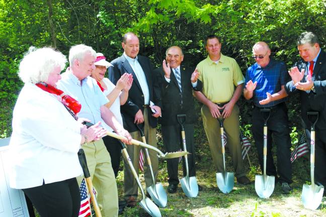 Photo by Chris Wyman Second from left, Vernon Township Vietnam War veteran John Harrigan is shown breaking ground at the new veteran&#x2019;s cemetery on Route 94 in Sparta. At the far left is Vernon resident Vernoy Paolini, the President of the Northern New Jersey Veterans Memorial Cemetery.