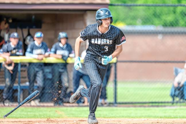 Tyler Haberstroh watches the ball he hit to the right side of the infield, as he exits the batters box against Pequannock.
