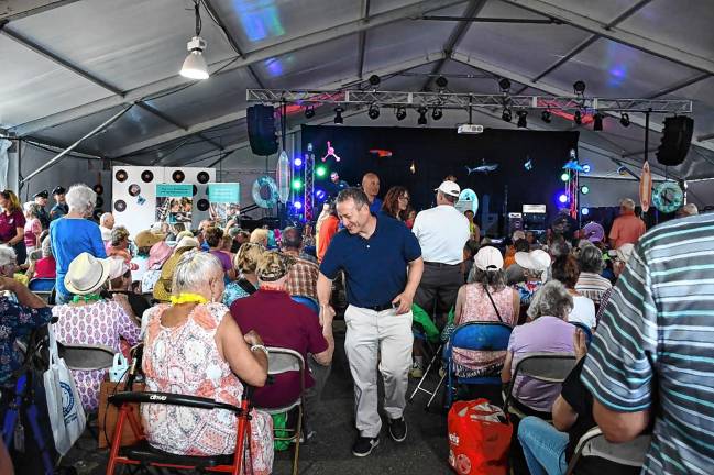 <b>Rep. Josh Gottheimer, D-5, greets people at the Senior Day event Thursday, Aug. 7 at the fairgrounds. (Photo provided)</b>