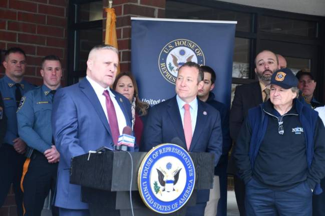 Newton Police Chief Steven VanNieuwland, left, speaks Jan. 17 in front of the municipal building. At center is Rep. Josh Gottheimer, D-5. (Photos courtesy of Rep. Josh Gottheimer)