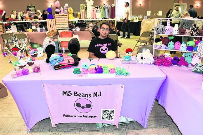 Sophia Palm of Saddle Brook sits at the Ms. Beans NJ table.
