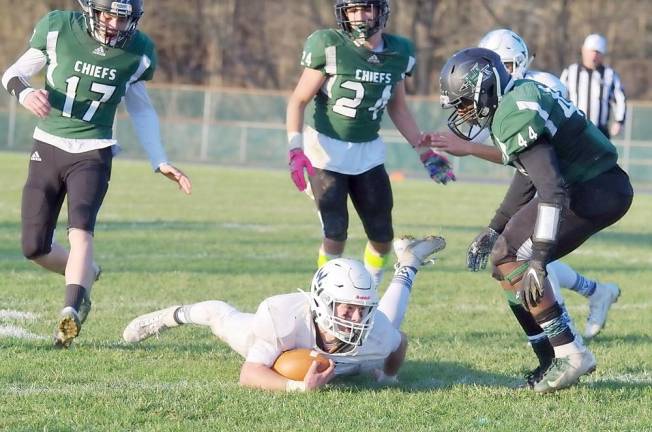 Wallkill Valley ball carrier Bobby Mcmillan falls to the ground after being hit in the fourth quarter.