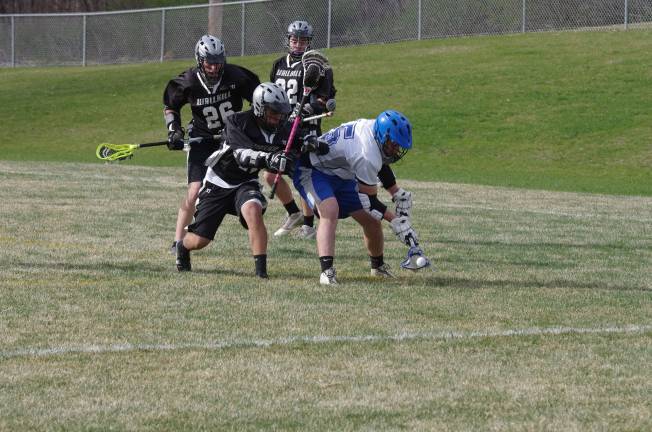 Kittatinny Regional High School defeated Wallkill Valley Regional High School in boys varsity lacrosse on Monday, April 28, 2014. The final score was 20-5. Kittatinny clinched the NJAC Independence Division for its first championship in program history. The game took place at Kittatinny Regional High School in Newton, New Jersey.