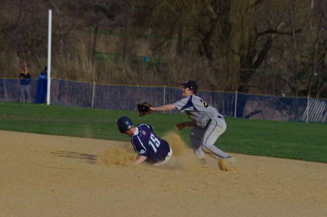 Sparta's Thomas Ruddy slides into second base.