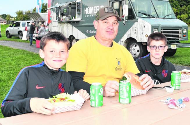 Wyatt, Dean and Dean Carrigan of Hardyston pose for a photo.