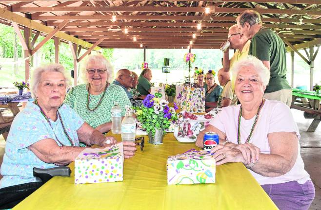 Lee Brennan and Carol McDole, both of Hardyston and Mary Lou of Pompton Plains sit at a table.