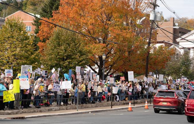 An estimated 600 people came to Newton for Saturday’s “No Kings” rally.