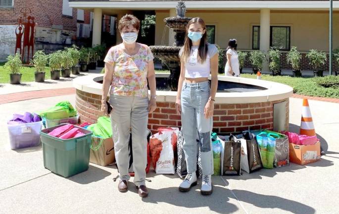 Ali Stoner (right) with her grandmother, Lois Pellow, and some of the supplies they gathered (Photo provided)