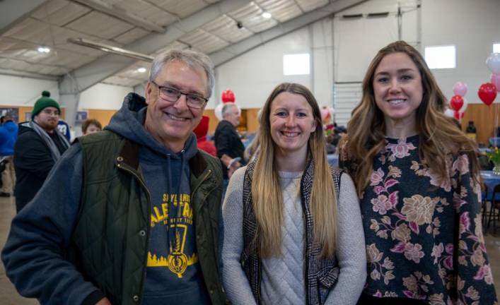 Bruce Tomlinson, Krystal Geisel and Haley McCracken organized the fundraiser for Project Self-Sufficiency.