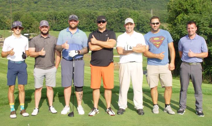 Contestants in the 1st qualifier for the Sussex County Long Drive Championship give the event a thumbs up