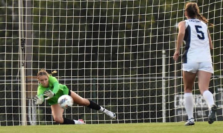 Brooke Ginsberg of Newton, N.J., rocking it out as a star goalie.