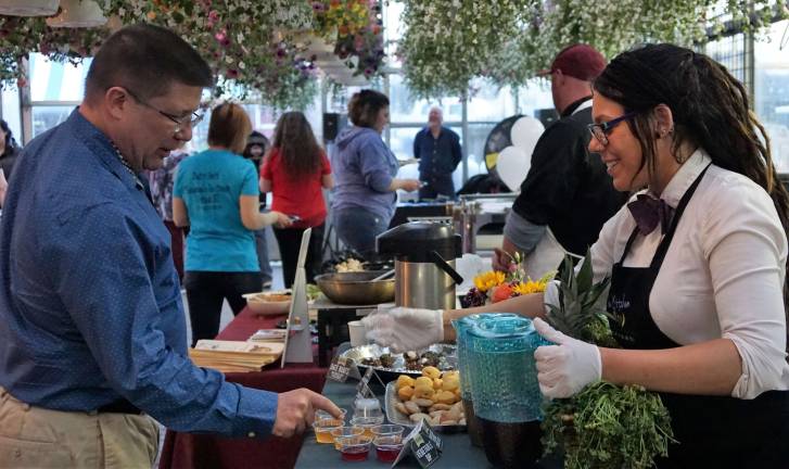 Healthy Thymes serves Kombucha to guests.