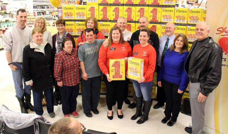 RoNetco associates, General Mills representatives and SCARC individuals celebrate the Partners in Caring event.